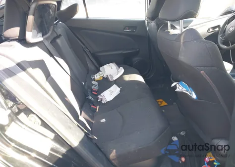 2021 Toyota Prius Le from USA, damaged, VIN JTDKAMFU6M3142669